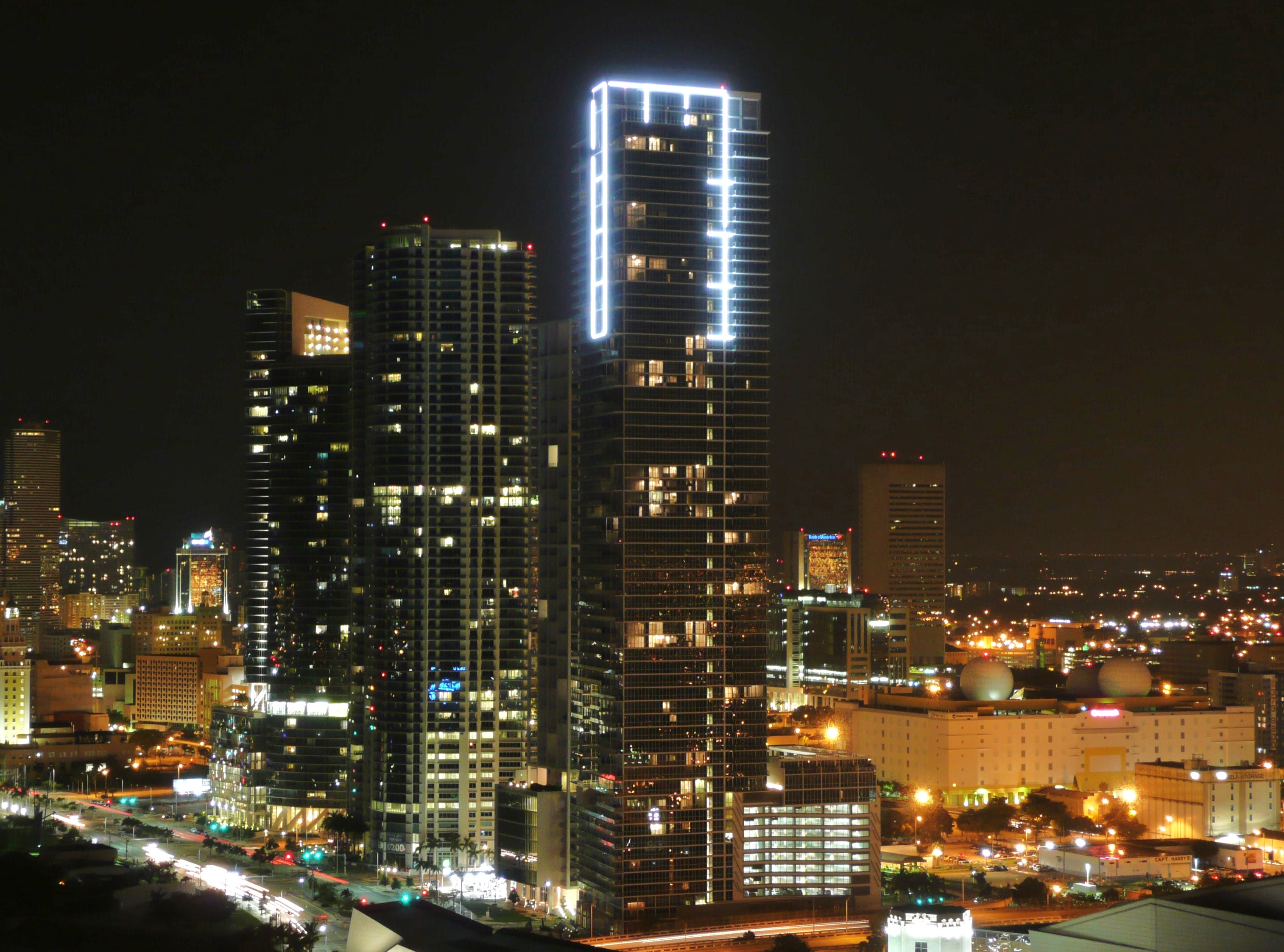 The Marquis tower illuminated at night on Biscayne Boulevard in Downtown Miami