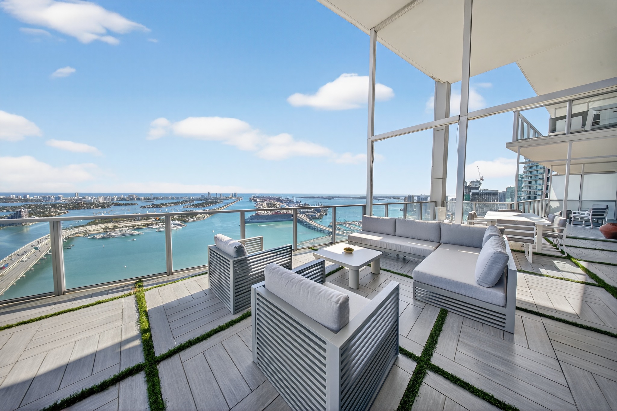 Outdoor lounge terrace with panoramic water views