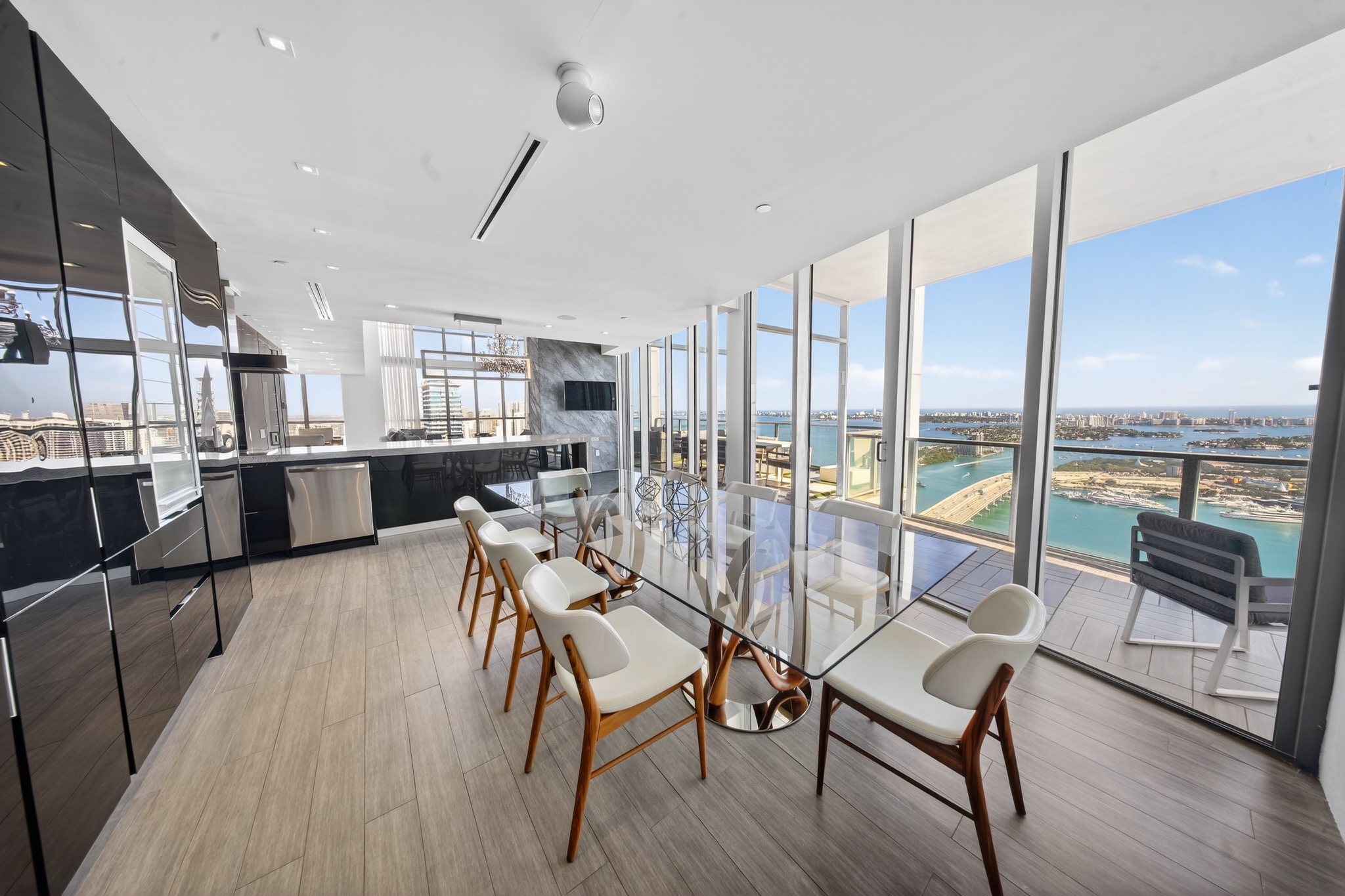 Modern kitchen and dining area with bay views